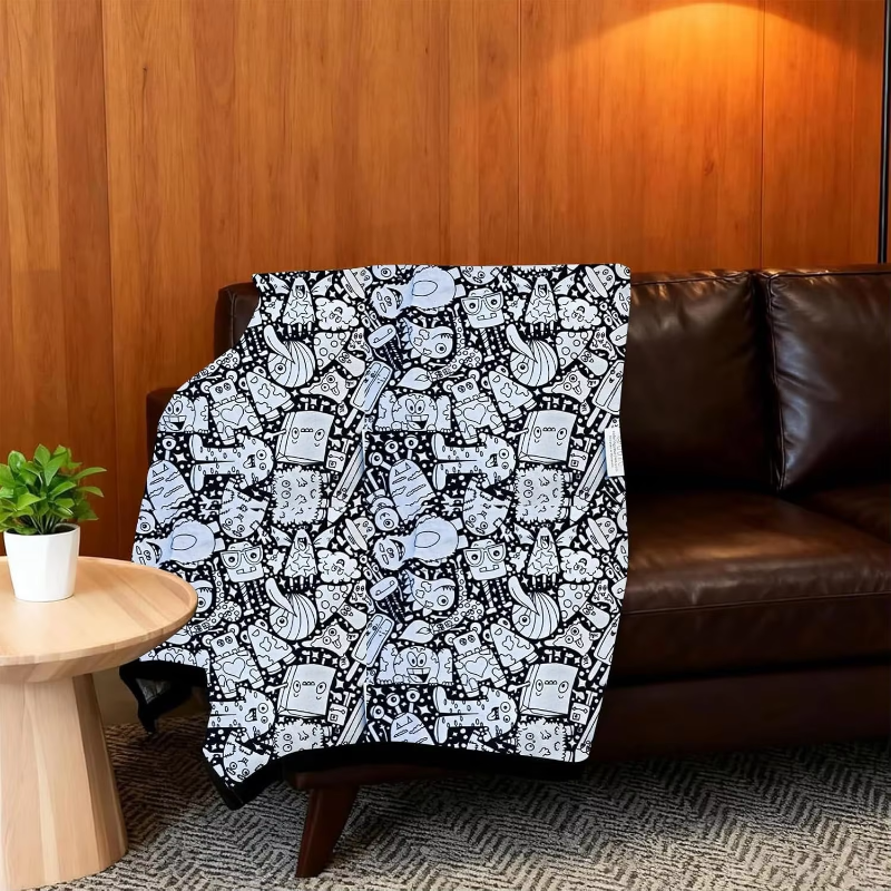 Uncolored character coloring mat draped over a brown sofa