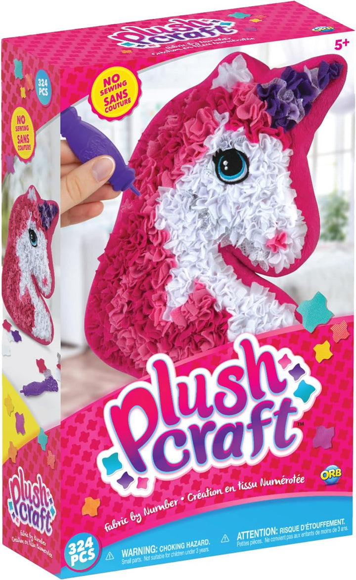 Boxed unicorn pillow craft kit showing a pink, white, and purple textured unicorn design.