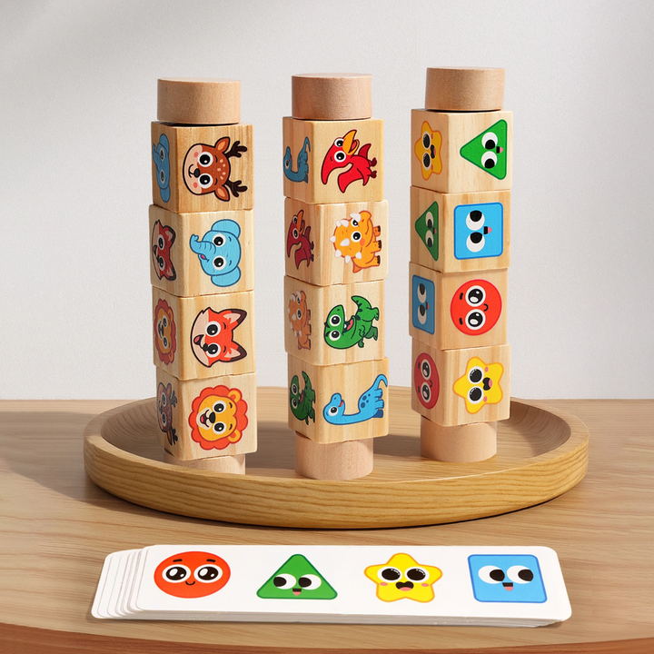 Three rotating picture-cube bars standing on a wooden base beside shape-matching cards