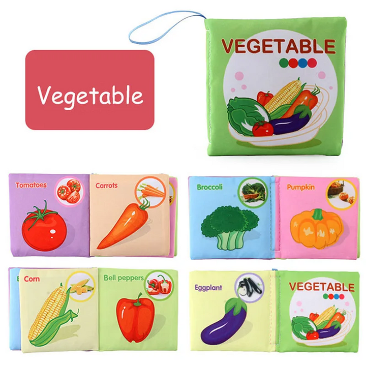 Vegetable fabric book with a green cover and illustrated tomato, carrot, broccoli, and pumpkin pages.
