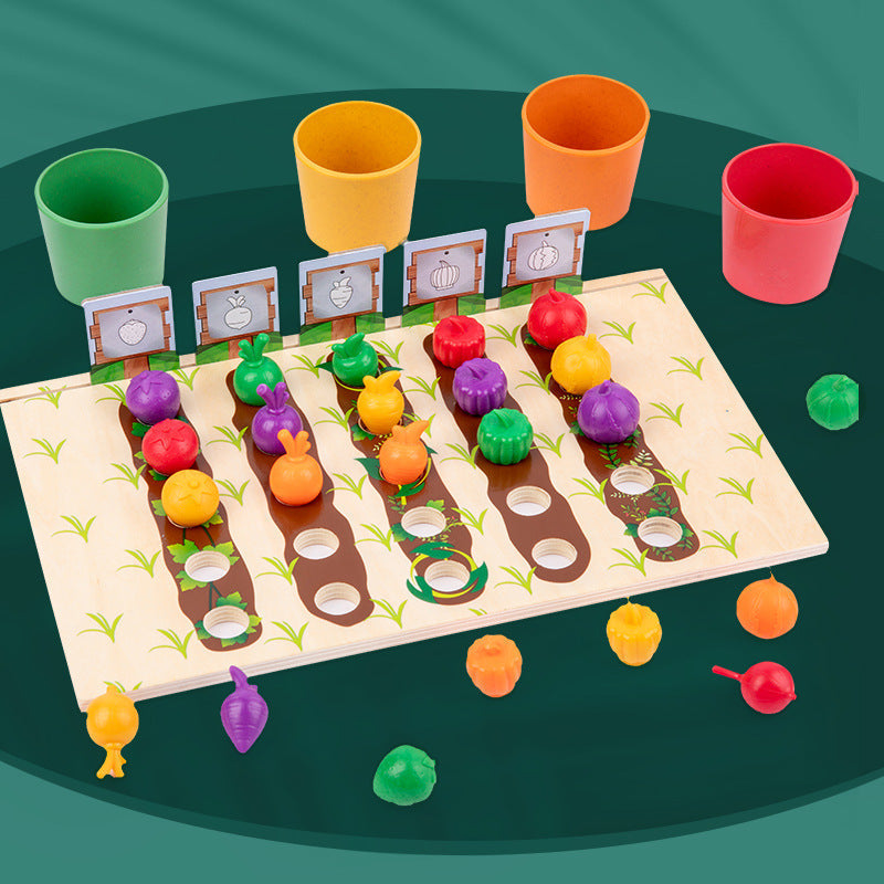 Vegetable pieces arranged on a counting board with number cards and colorful sorting cups