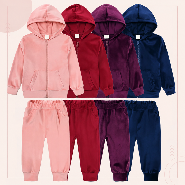 Pink, red, purple, and navy zip-up hoodies with matching cuffed pants