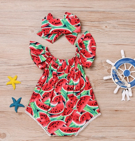 Watermelon-print baby dress with ruffled shoulders, white trim and a matching bow headband