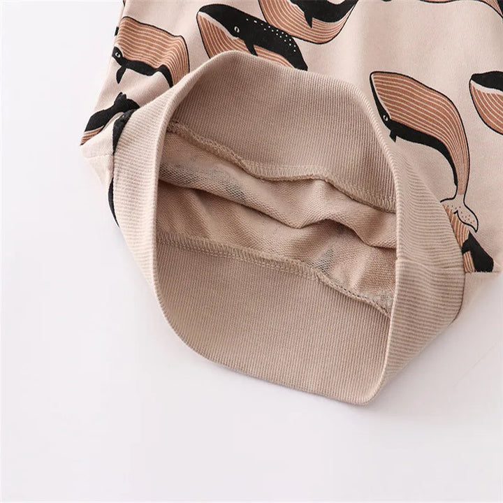 Close-up of the Brown whale-print sweater&