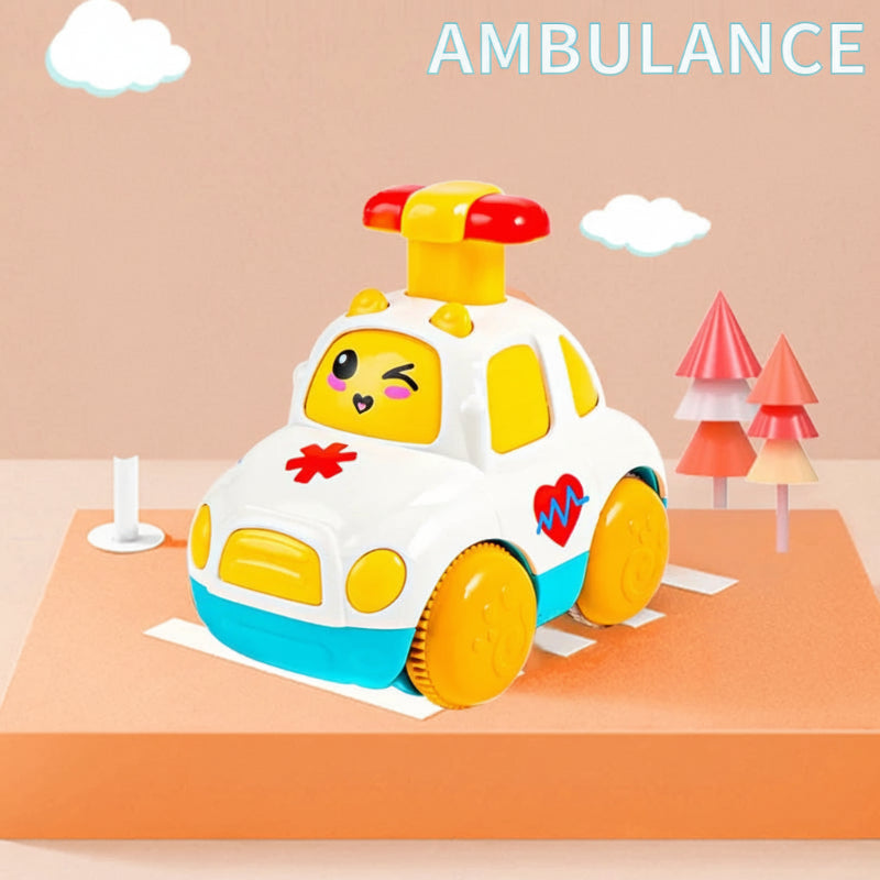 White toy ambulance with yellow wheels, a roof-mounted button, and a cartoon windshield face.