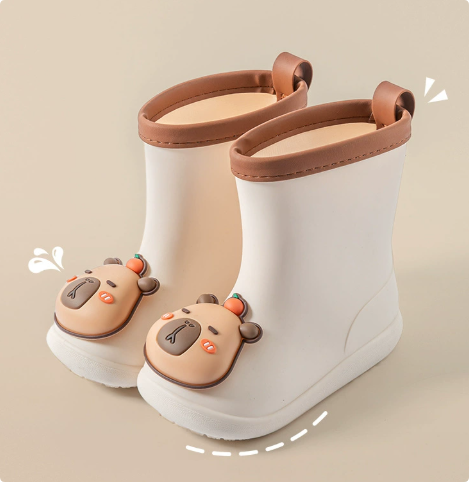 White bear rain boots with brown trim and back pull loops