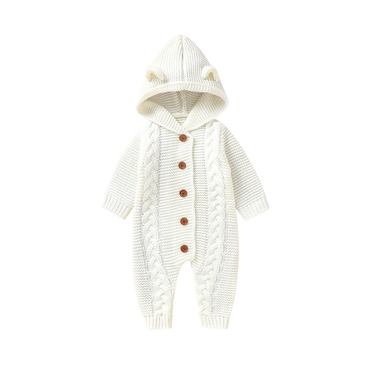 White knitted baby jumpsuit with an attached ear-detail hood, front buttons, and ribbed cuffs