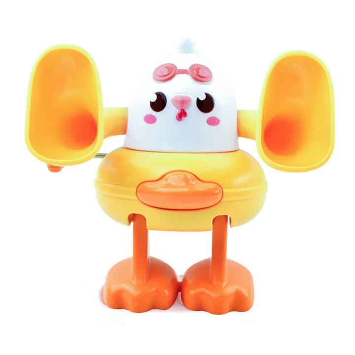 White chick wind-up toy with yellow wings and orange feet