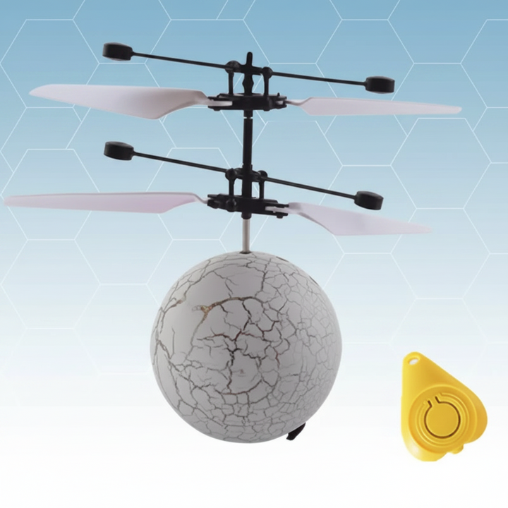 White crackle-pattern flying ball with stacked rotor blades and a yellow remote