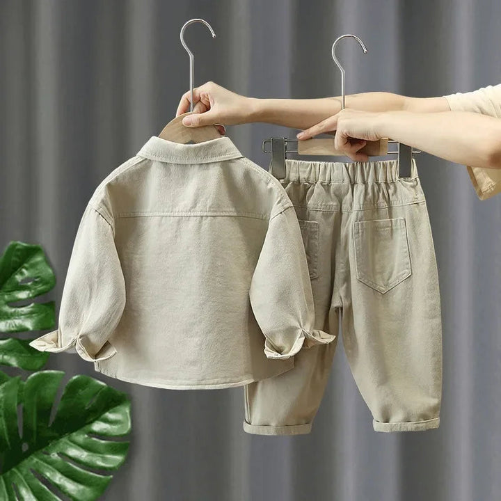 Back of the white denim shirt and matching pants with an elastic waistband