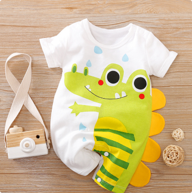 White short-sleeve baby romper with a green dinosaur graphic and yellow side spikes