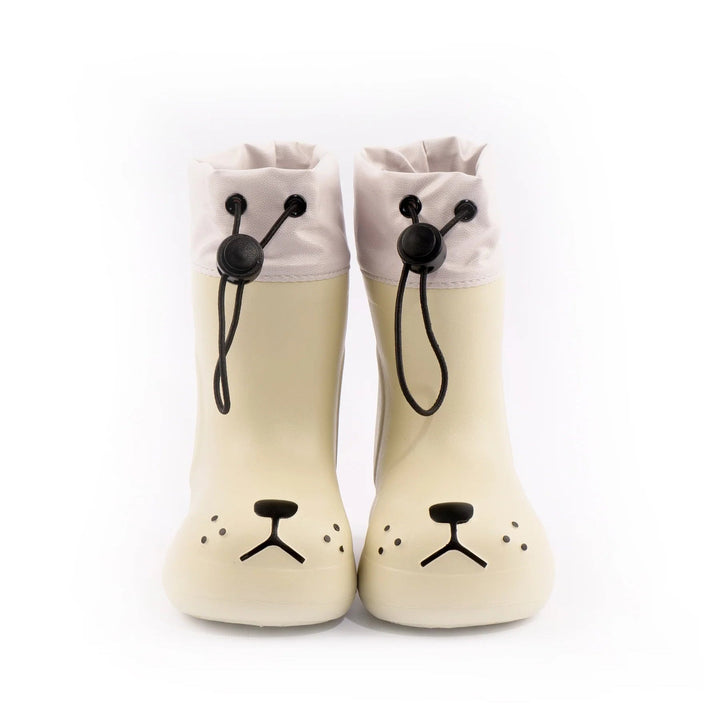 Front view of white dog-face rain boots with drawcord cuffs and black nose details