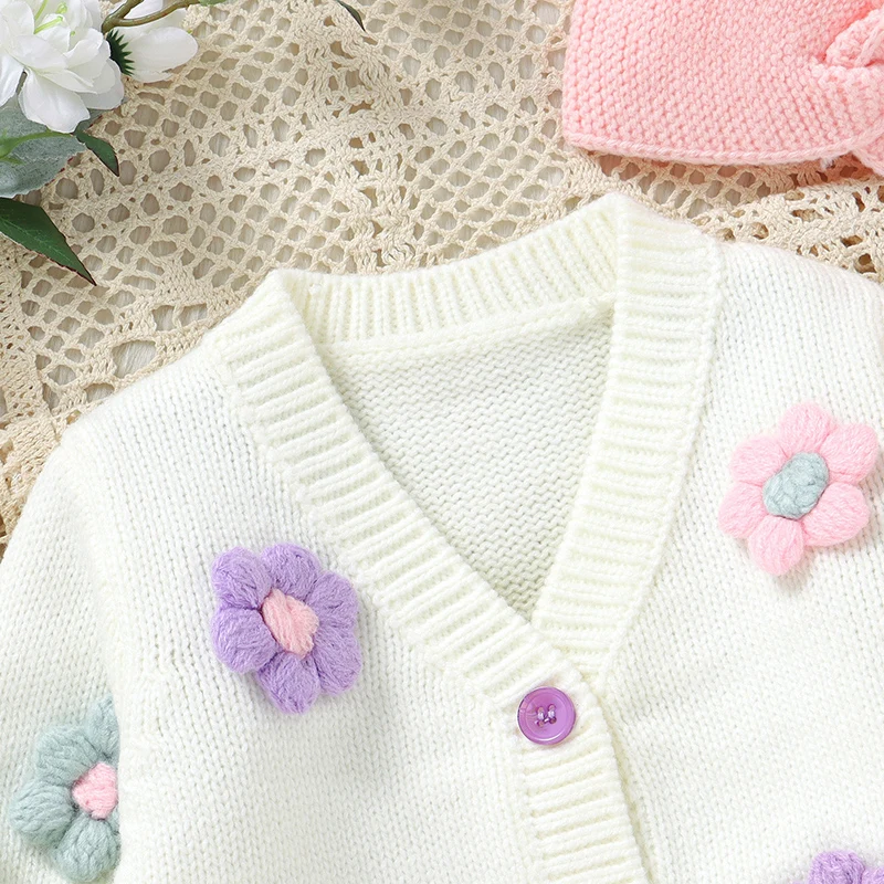 Close-up of the white cardigan&