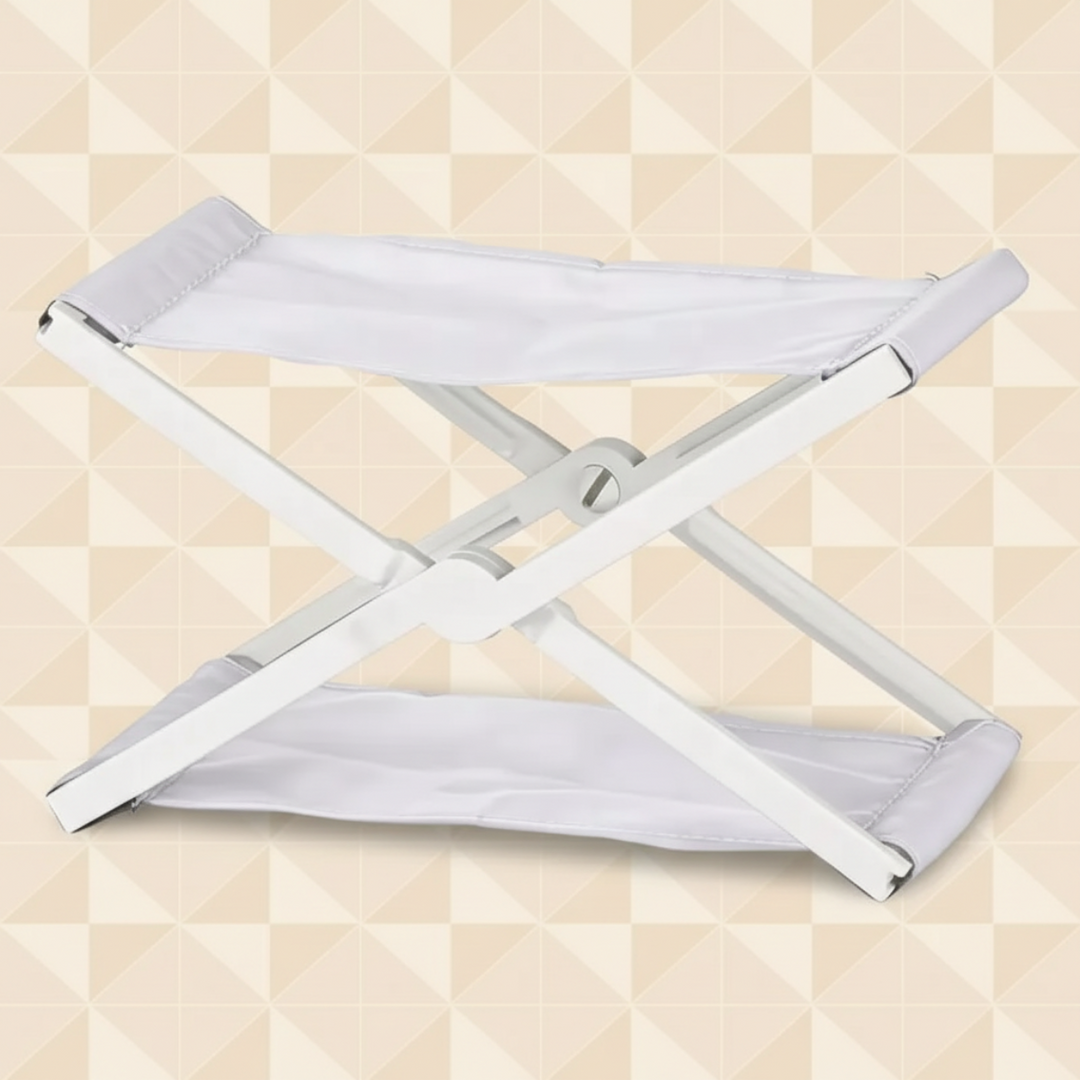 White fabric folding headrest with a matching white cross-frame