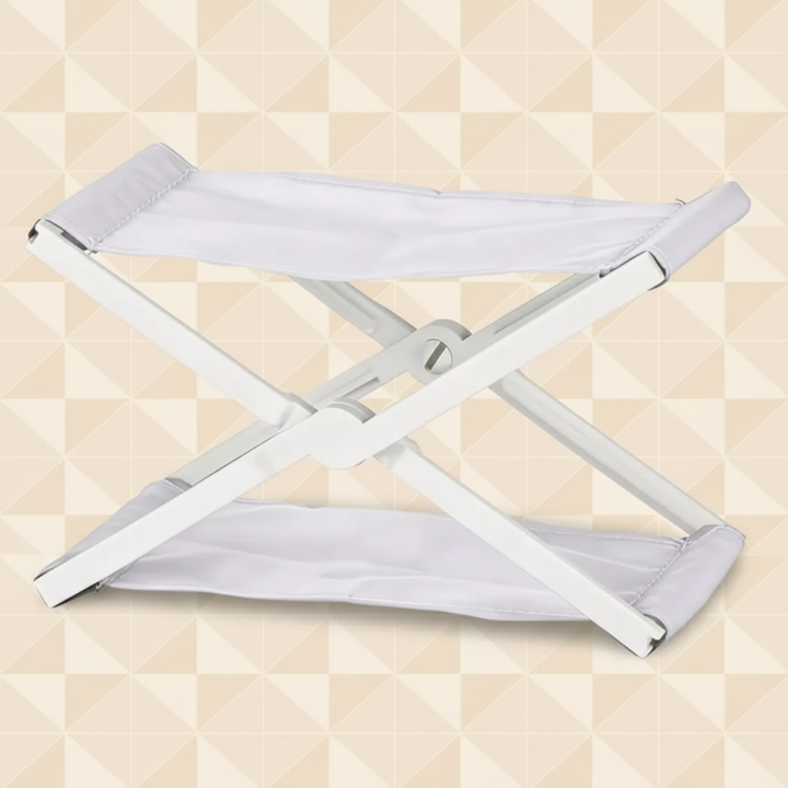 White fabric folding headrest with a matching white cross-frame