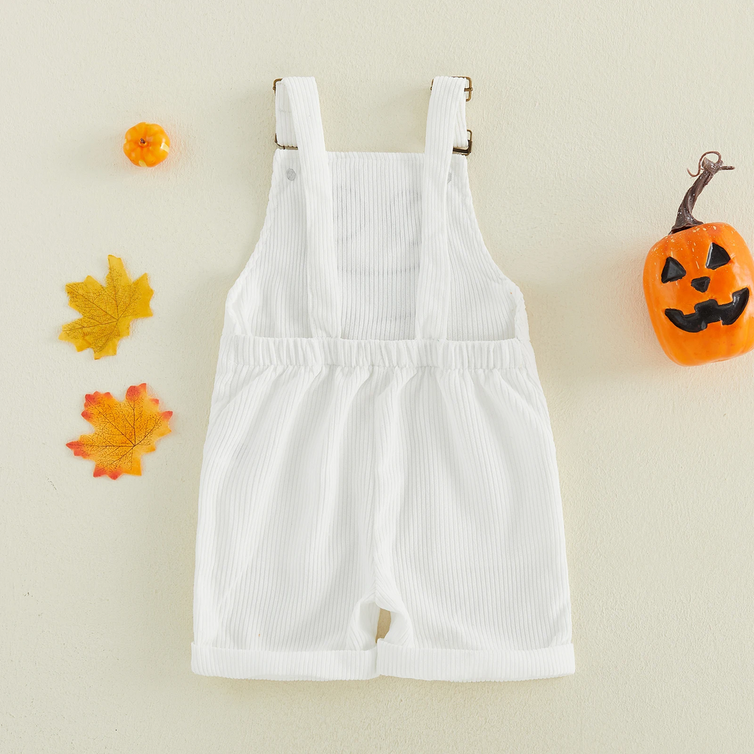 Back view of white ribbed Halloween overalls showing shoulder straps, a gathered waist, and cuffed hems.