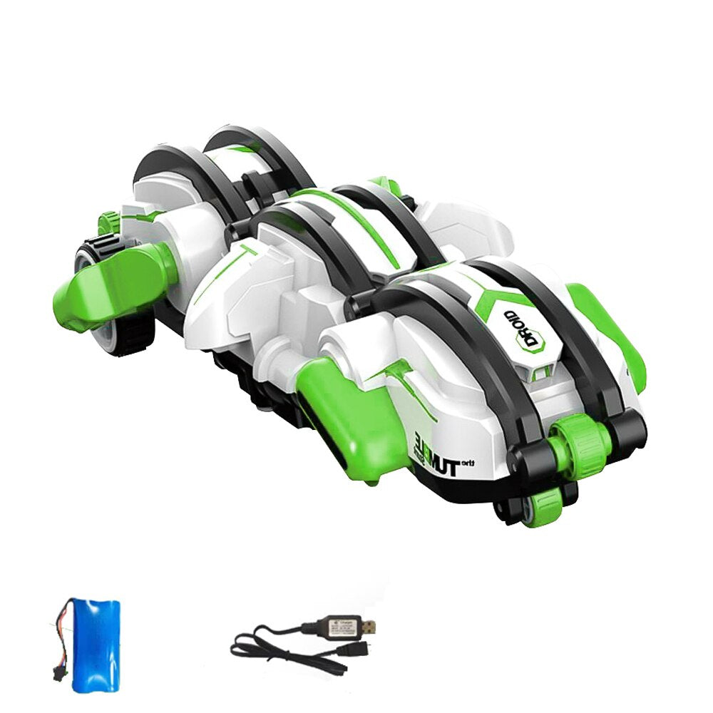 White and green remote control stunt car with a battery pack and USB charging cable