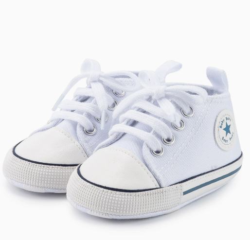 White lace-up baby sneakers with toe caps and heel pull tabs