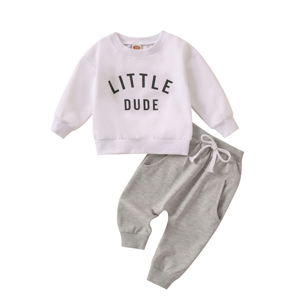 White Little Dude sweatshirt paired with gray drawstring pants