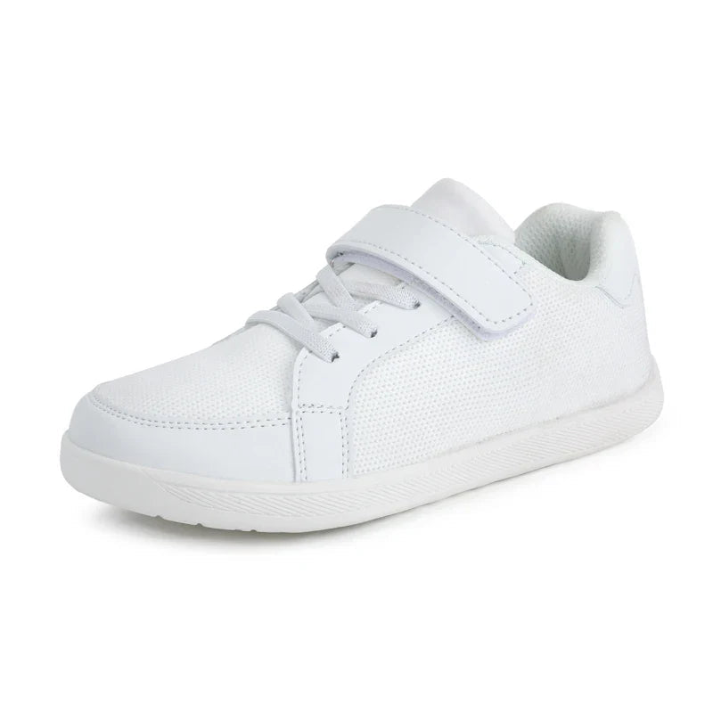 White kids' mesh sneaker with matching laces, a hook-and-loop strap and a white sole