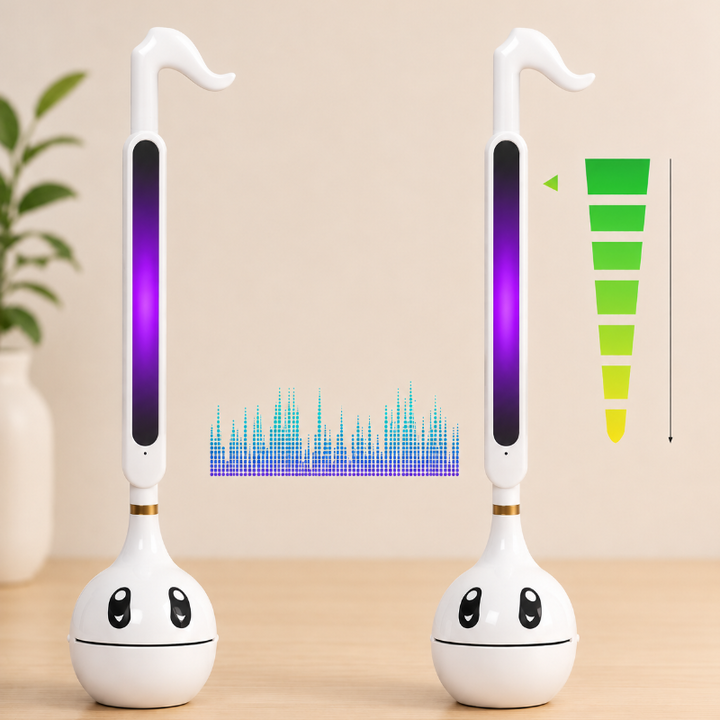Front views of the white music toy with a glowing touch strip and a volume-level graphic.