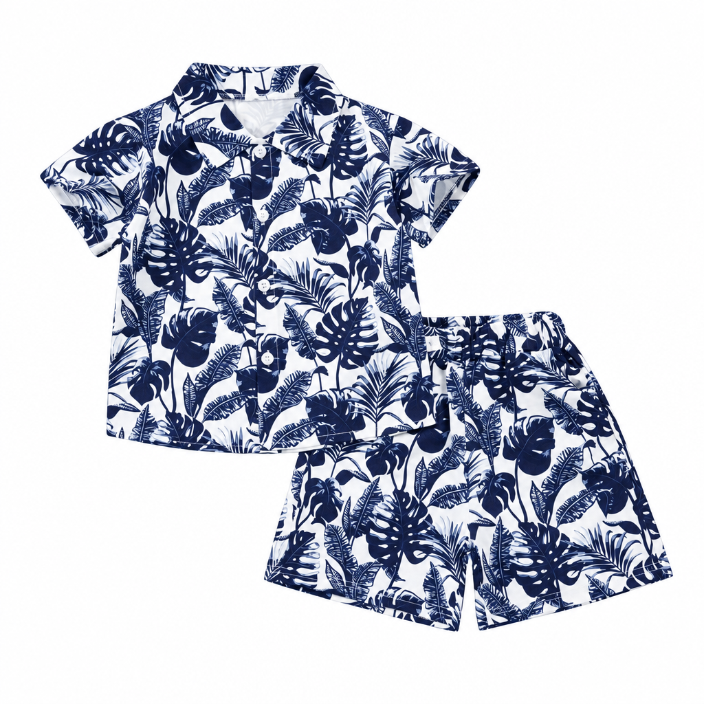 White shirt and matching shorts with navy tropical leaf patterns