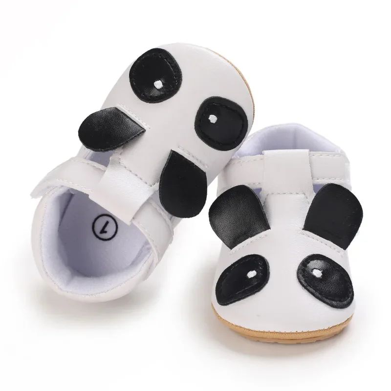 Panda baby shoes with black-and-white faces and white interiors
