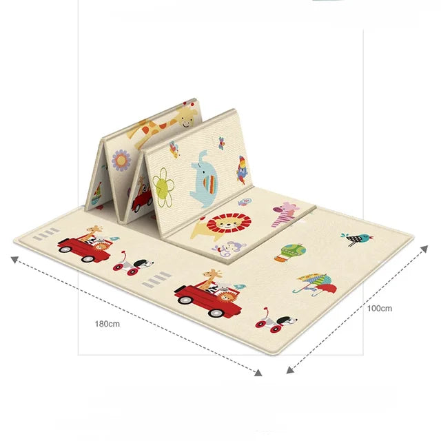 White animal-and-vehicle play mat shown partly folded with 180 x 100 cm measurements