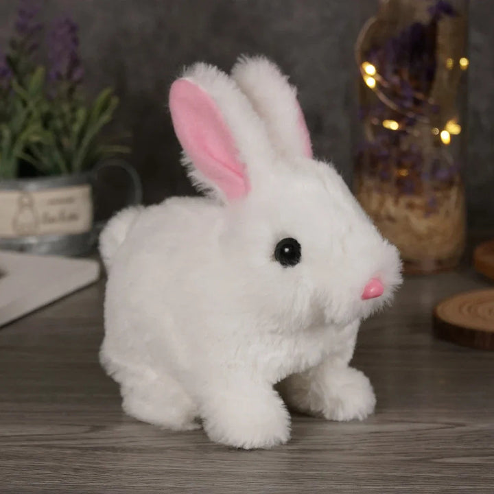 White plush rabbit with pink inner ears and a pink nose