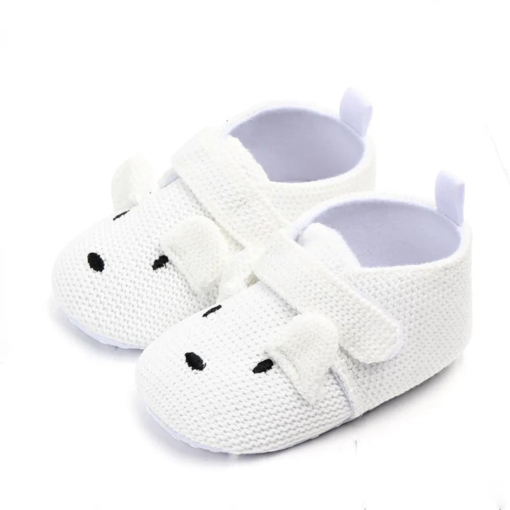 White rabbit baby slippers with knit uppers, straps and heel loops