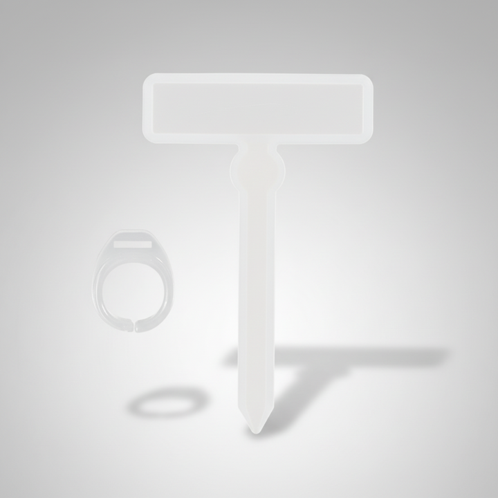 White reading guide with a clear window and matching finger ring.