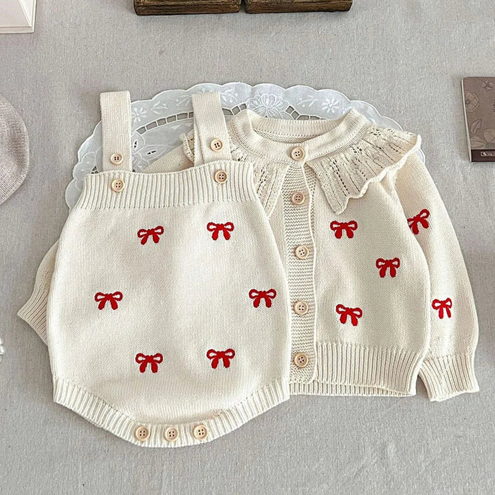 White and red bow knit set with a ruffled cardigan collar and strap bodysuit