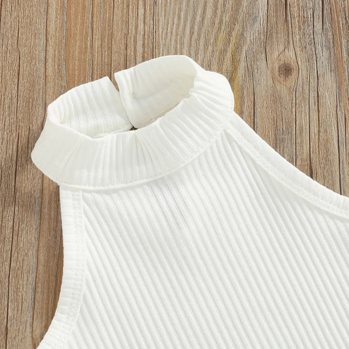 White ribbed sleeveless top with a raised neckline.