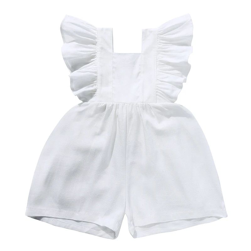 White baby romper with ruffled shoulder straps, a gathered waist, and short legs.