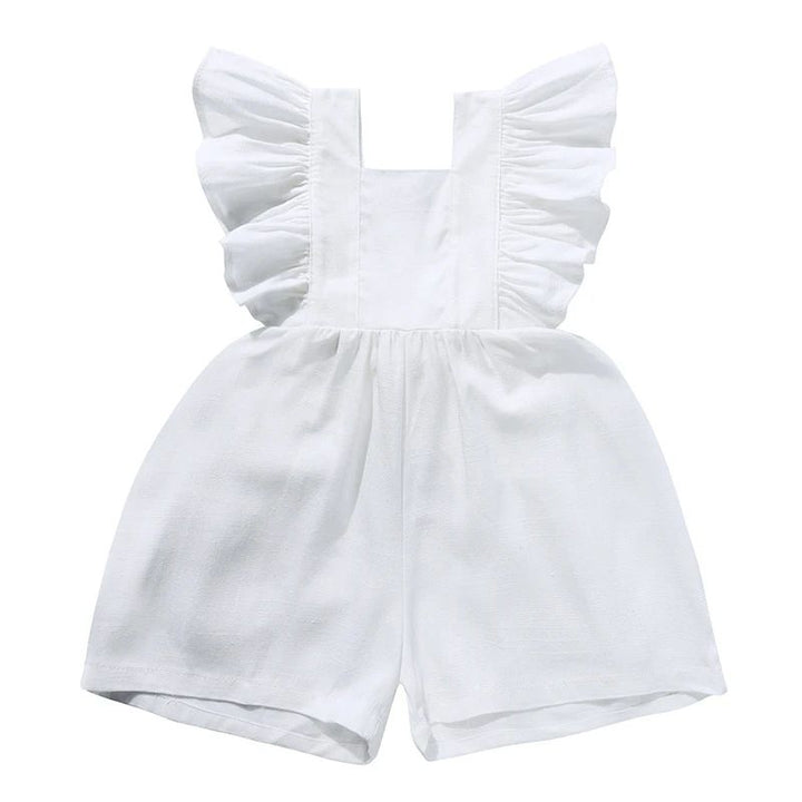 White baby romper with ruffled shoulder straps, a gathered waist, and short legs.