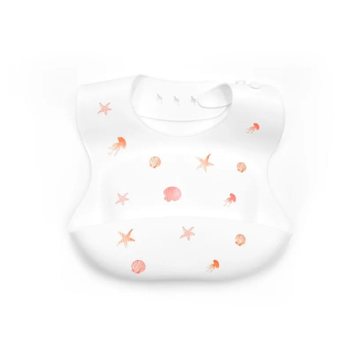 White silicone baby bib with shell and starfish prints and a curved front pocket