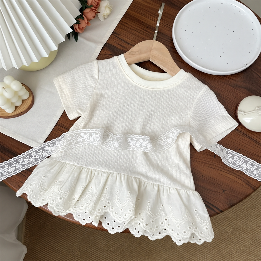 White short-sleeve cotton T-shirt with an embroidered scalloped lace hem.