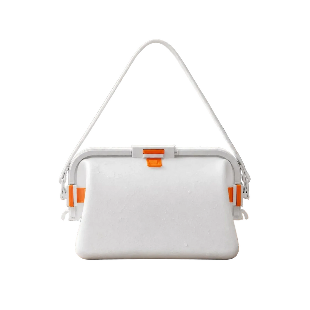 White silicone shoulder bag with a matching strap and orange clasp accents.