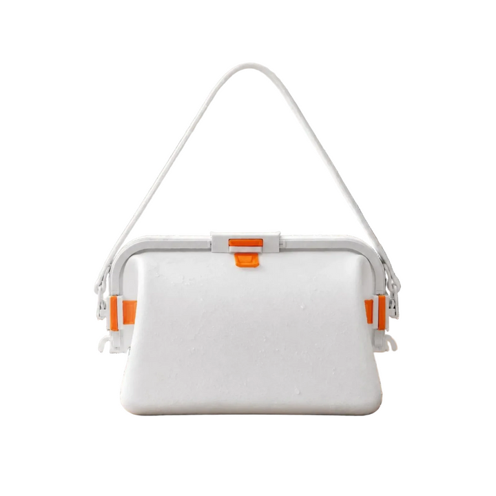 White silicone shoulder bag with a matching strap and orange clasp accents.