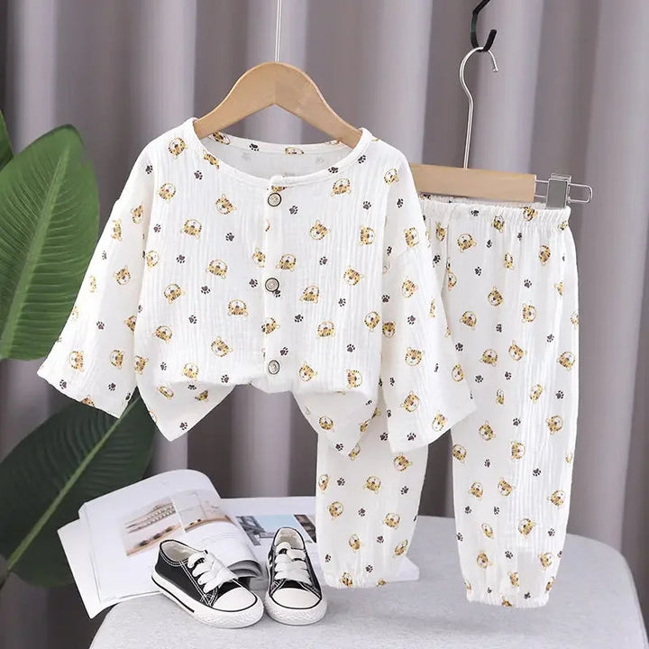 White button-front pajama set with a small yellow and brown character print