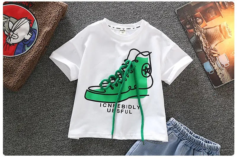 Close-up of the green high-top sneaker graphic on the white short-sleeve T-shirt