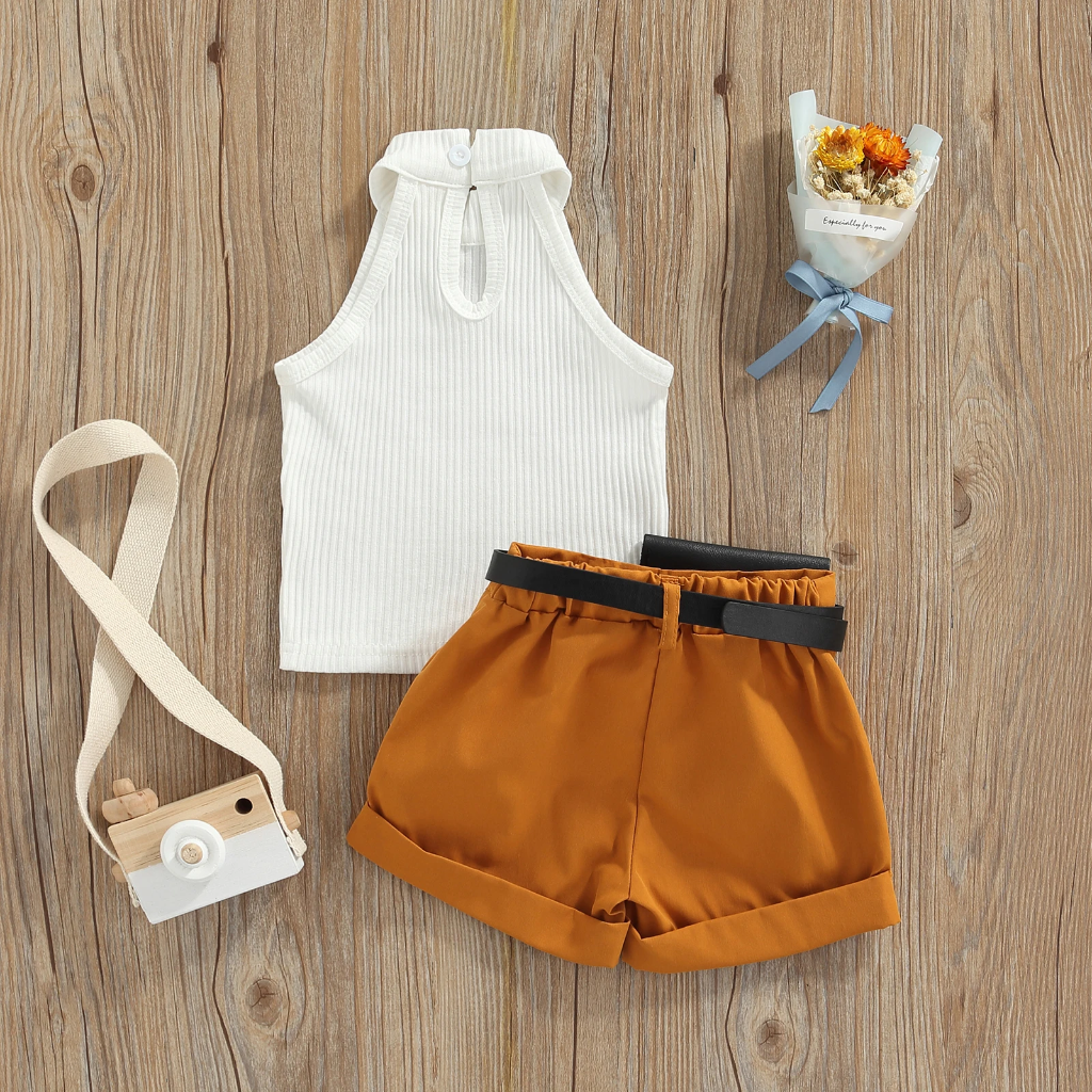 Back of the white ribbed top and mustard shorts showing the keyhole neckline and elasticized waistband.