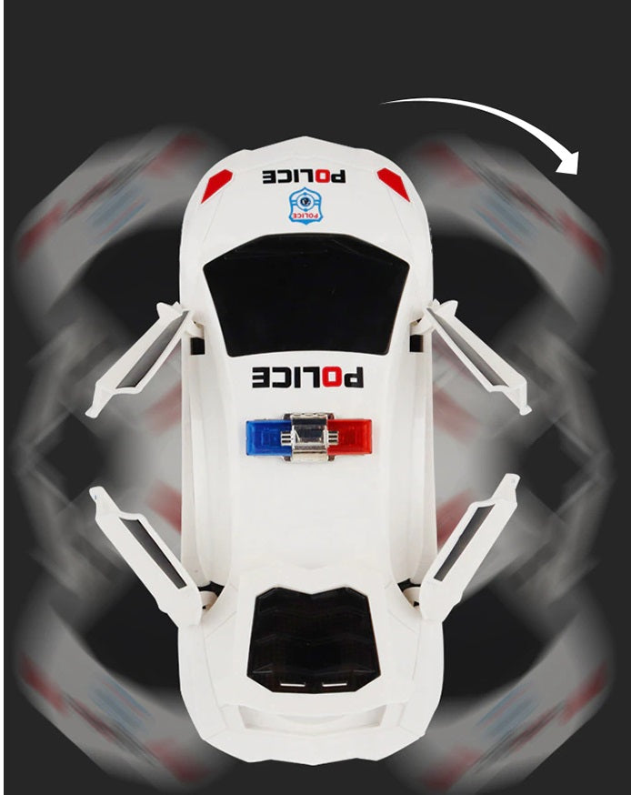 Top view of a white toy car with extended doors and an arrow illustrating its spinning motion.
