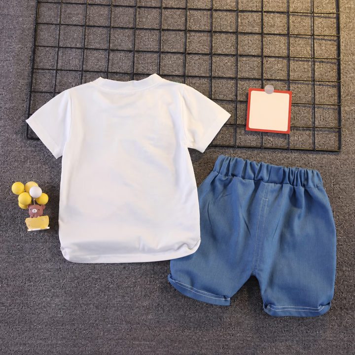 Back view of the white short-sleeve T-shirt and blue elastic-waist shorts