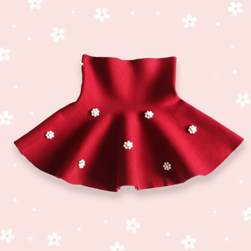 Wine red knit skirt with floral bead clusters and a wide waistband