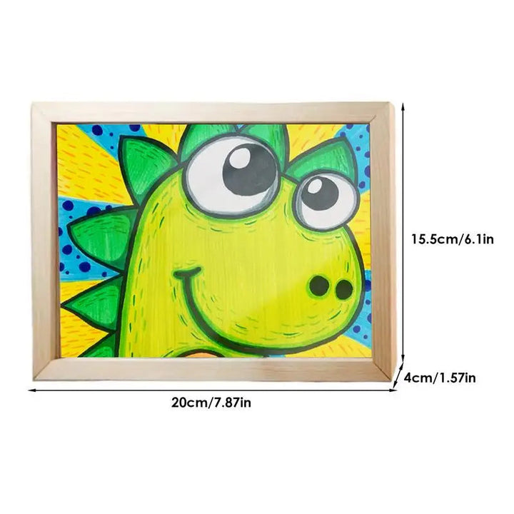 Wooden art frame with a green dinosaur drawing and dimensions of 20 x 15.5 x 4 cm
