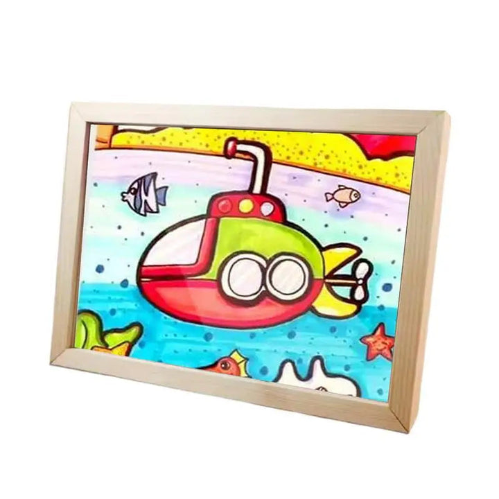 Wooden art frame displaying a colorful submarine drawing
