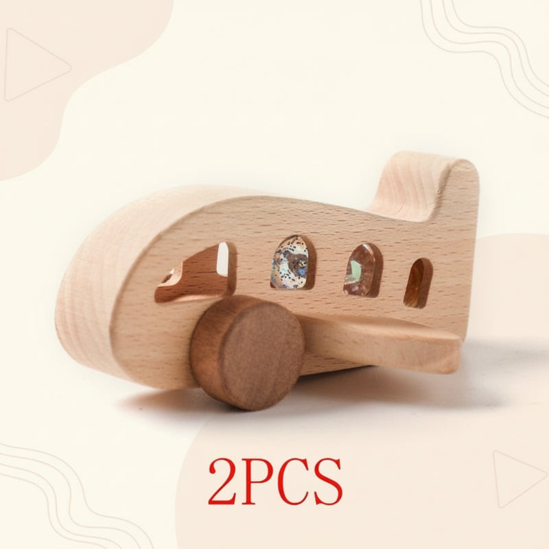 Wooden airplane with rounded window cutouts, broad wings, and large wheels