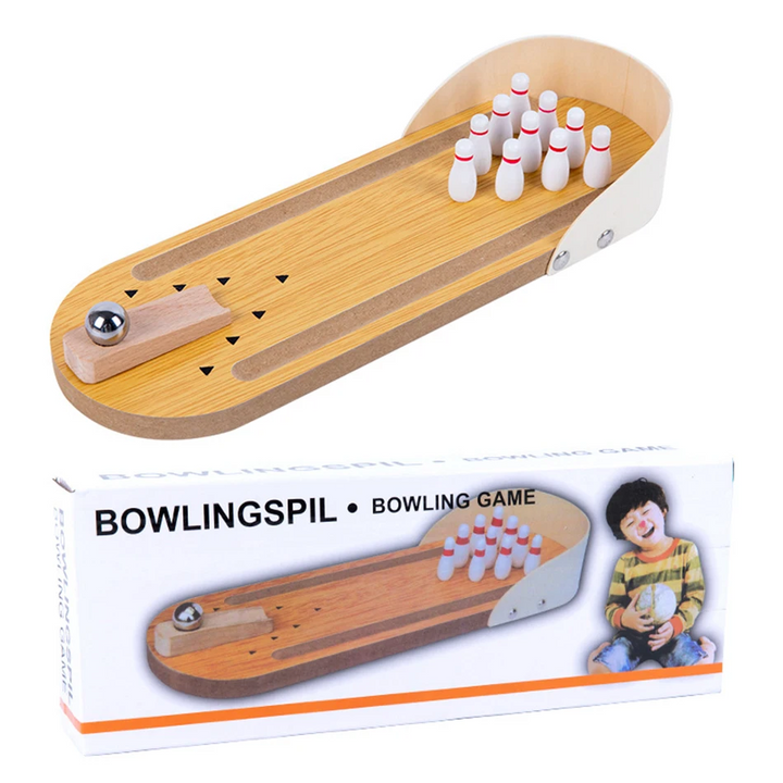 Mini wooden bowling lane, pins, and metal ball displayed above the game box