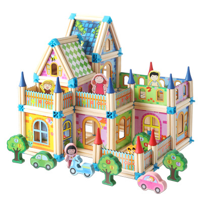 Colorful wooden castle built with blue connectors, figures, trees, and toy cars